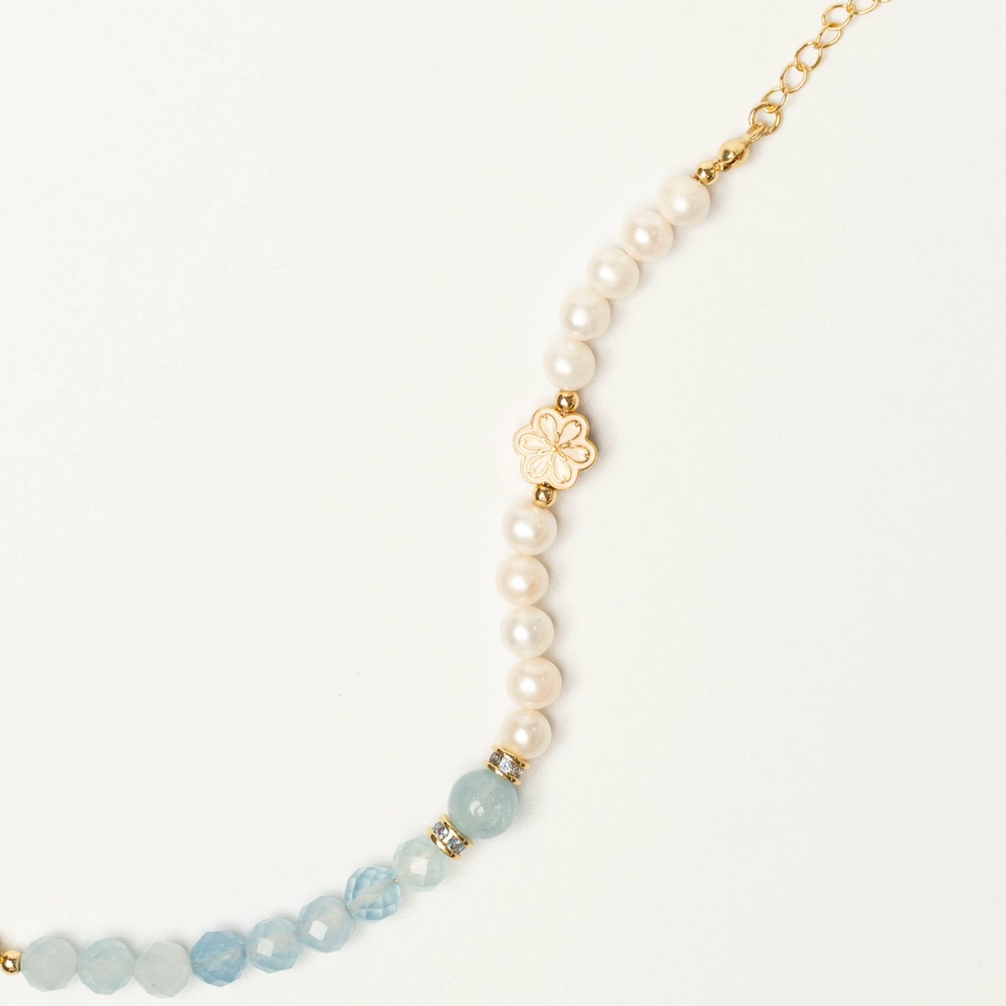 A signature spliced-design birthstone bracelet by Mulstio, showcasing innovative craftsmanship in modern energy jewelry for March.