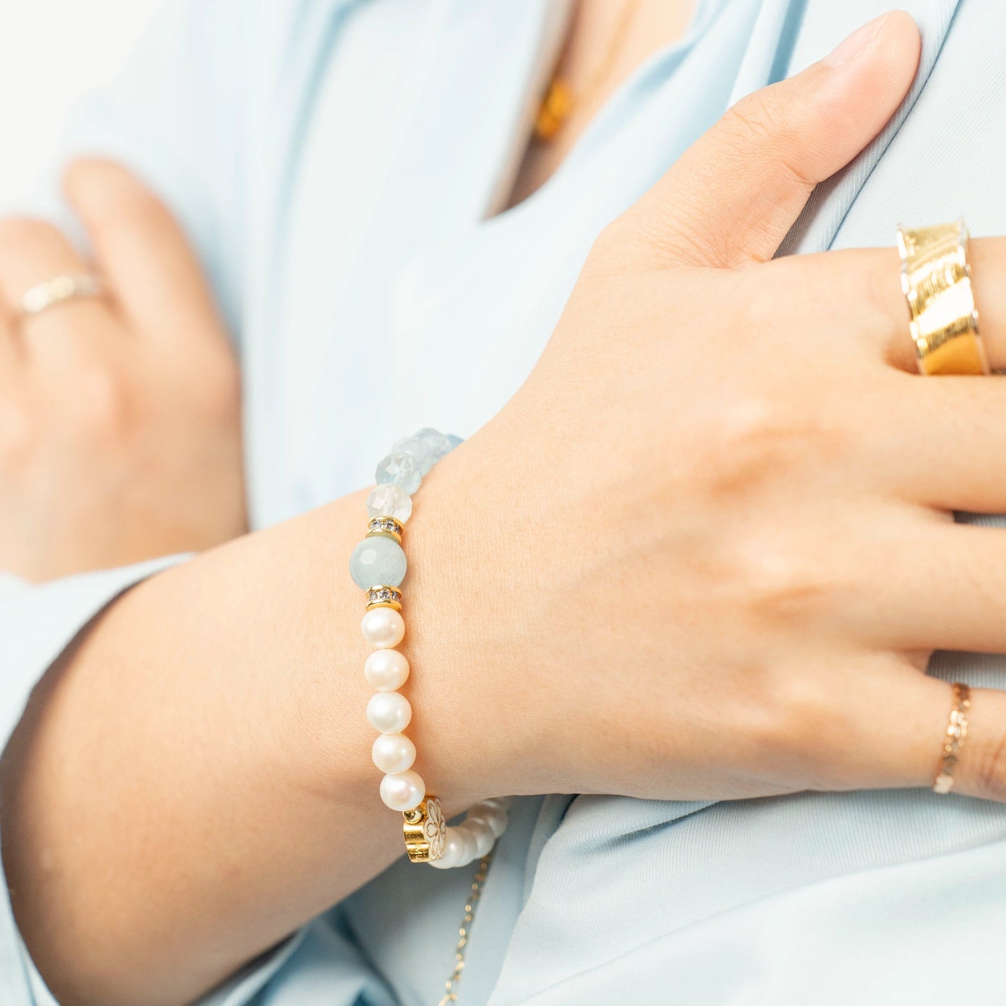 Discover the unique March Birthstone Bracelet from Mulstio. This spliced design of Aquamarine and Pearl is a sophisticated source of serene, protective energy.