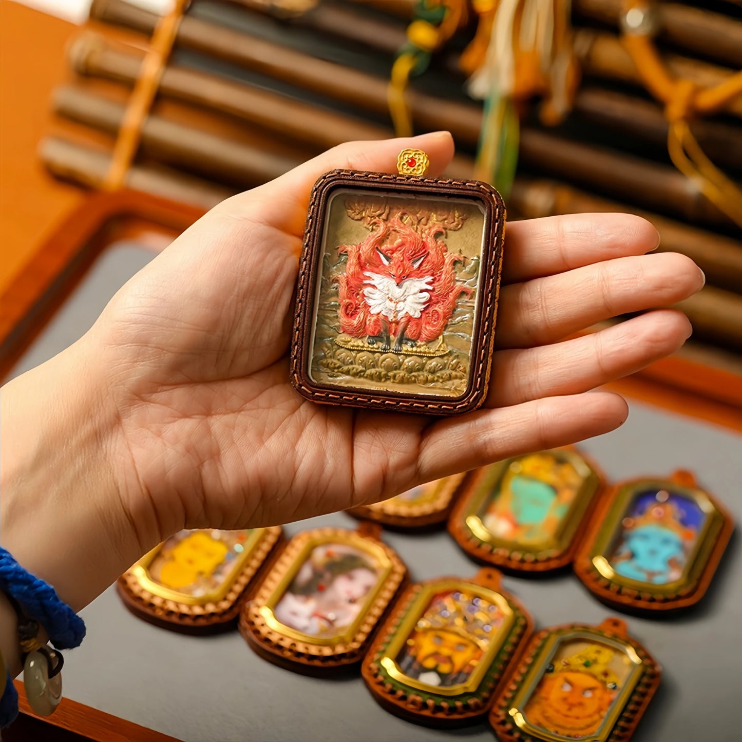 Close-up Thangka Pendant Showing Hand-Painted Details Mineral Pigments - Tibetan Buddhist Art