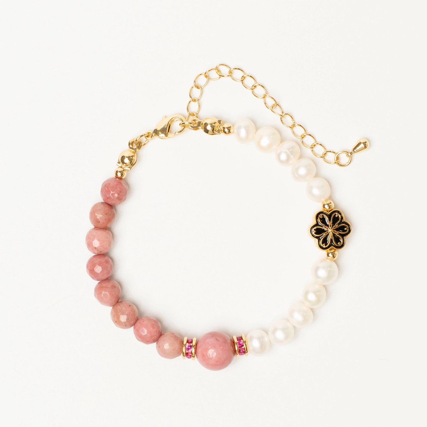 A talisman for the healing heart. This Mulstio bracelet uses Inca Rose to release old emotional wounds and Pearl to instill a sense of peace and self-worth.