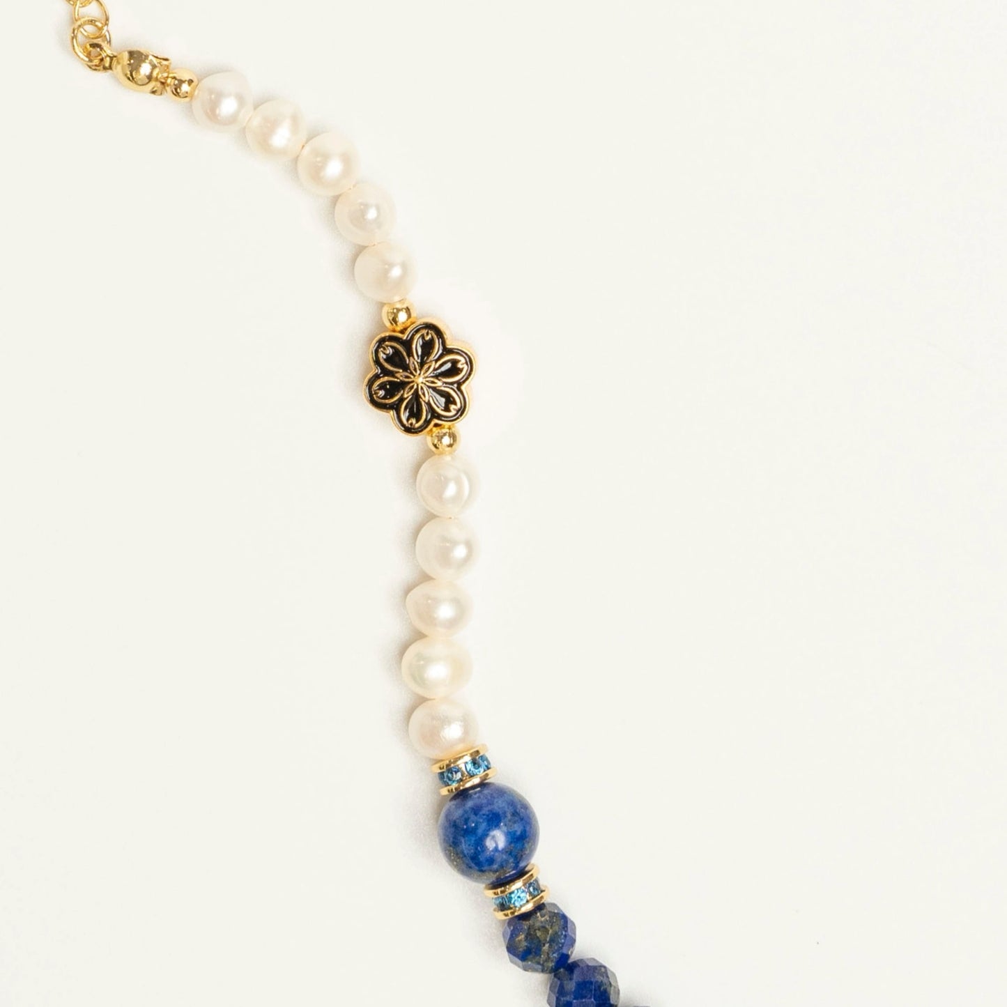 For the philosopher and truth-teller. Wear this Mulstio design with Lapis Lazuli to seek objective truth and Pearl to understand it with subjective compassion and wisdom.