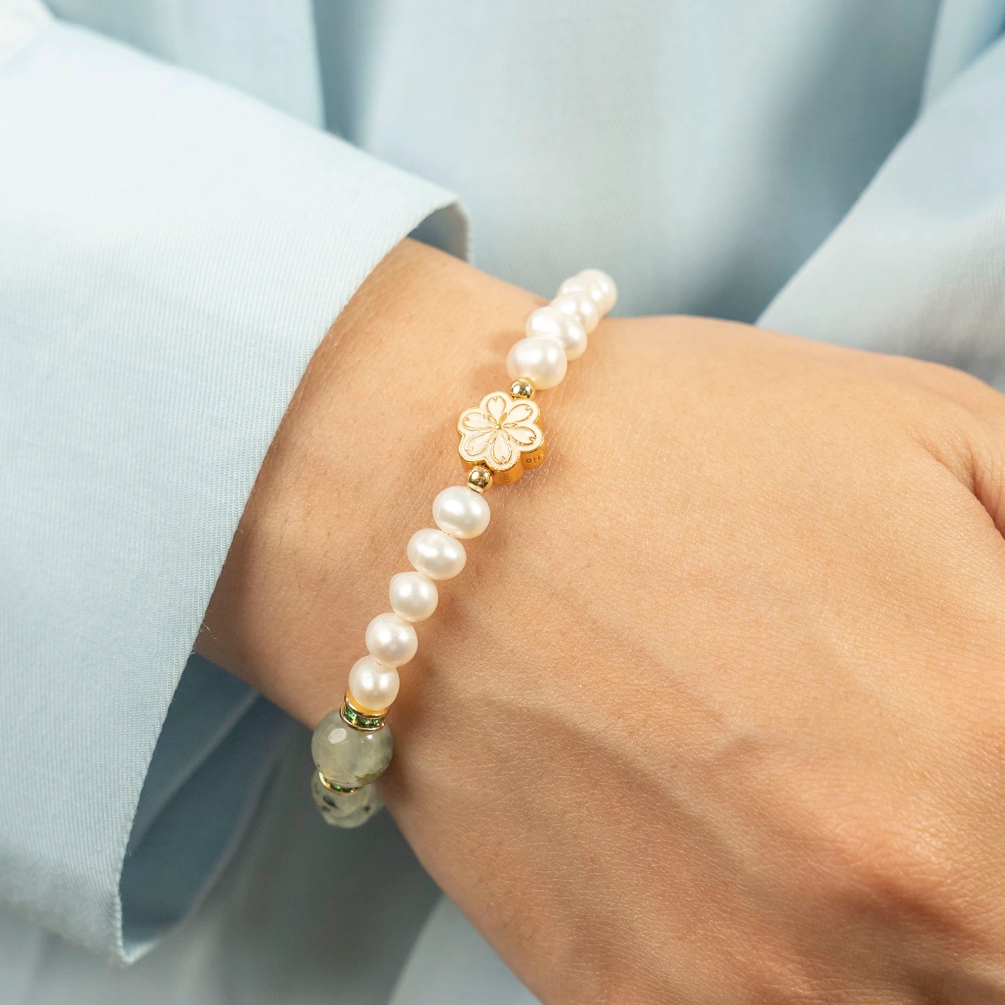 A truly unique August birthday gift for the spiritual seeker. This Mulstio bracelet combines the prophetic energy of Prehnite with the timeless wisdom of Pearl.