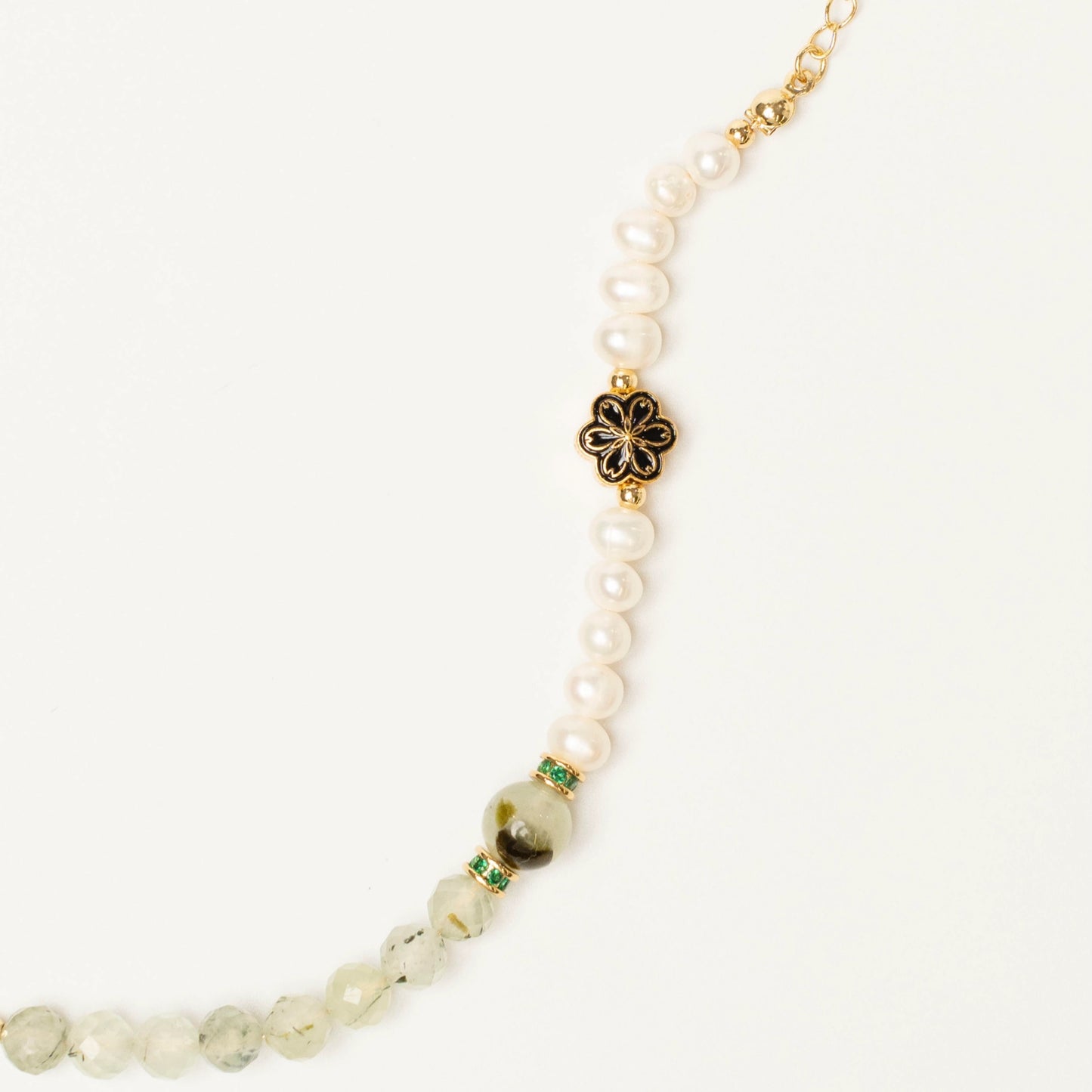 An essential tool for your meditation practice. Wear this Mulstio bracelet to quiet the mind with Prehnite and access deeper states of intuitive knowing with Pearl.