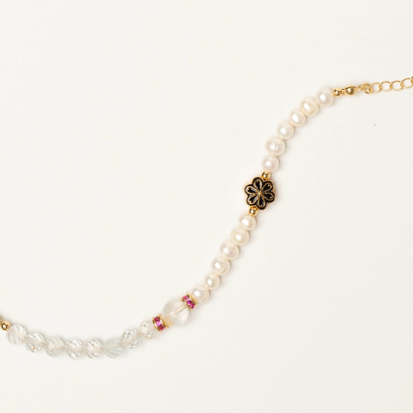 An ideal gift for new beginnings - graduations, promotions, or birthdays. This Mulstio bracelet symbolizes the perfect balance of vitality (Topaz) and wisdom (Pearl) needed for the journey ahead.