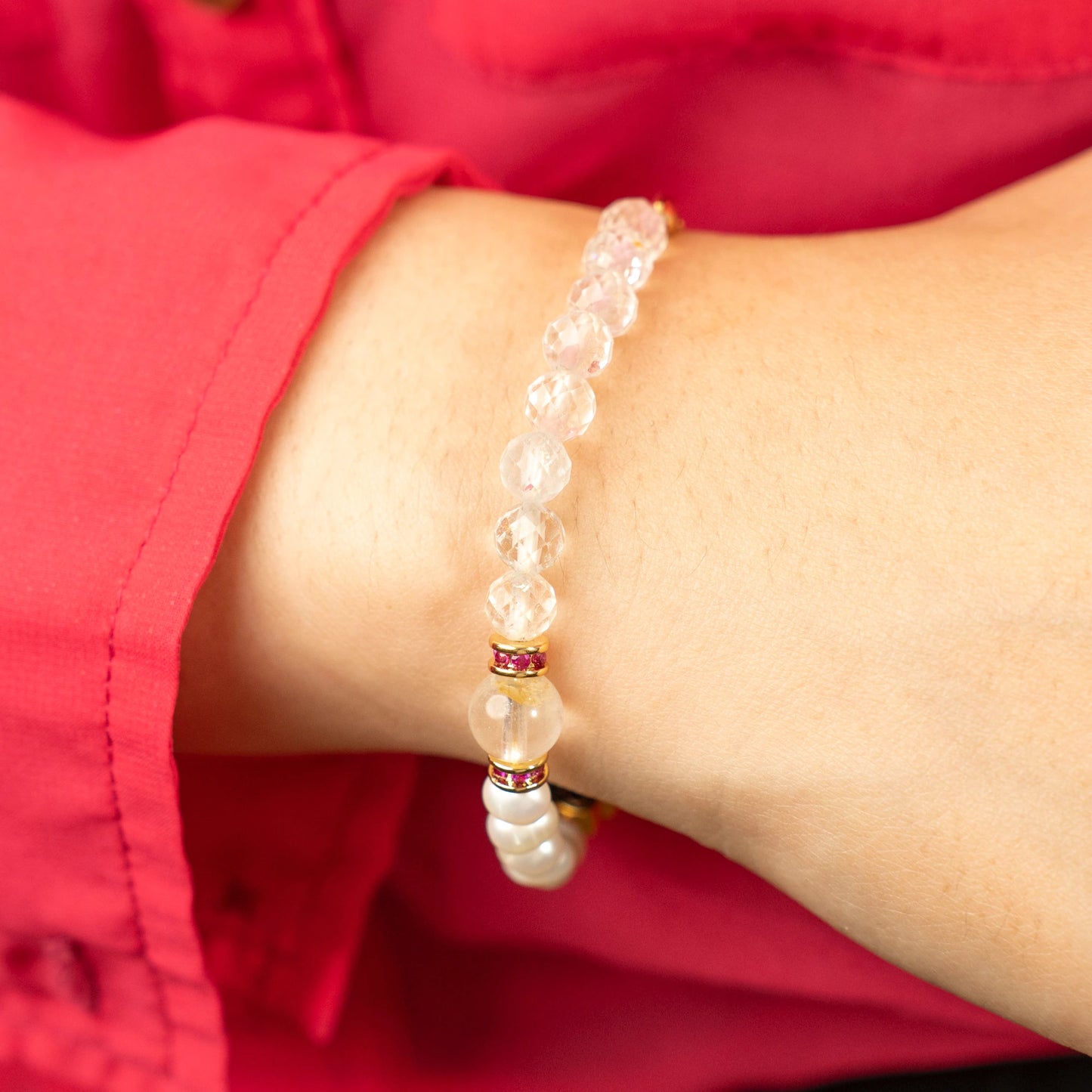 A woman embracing life with confidence, wearing the Mulstio April Birthstone Bracelet as a reminder to approach challenges with both vitality and inner wisdom.