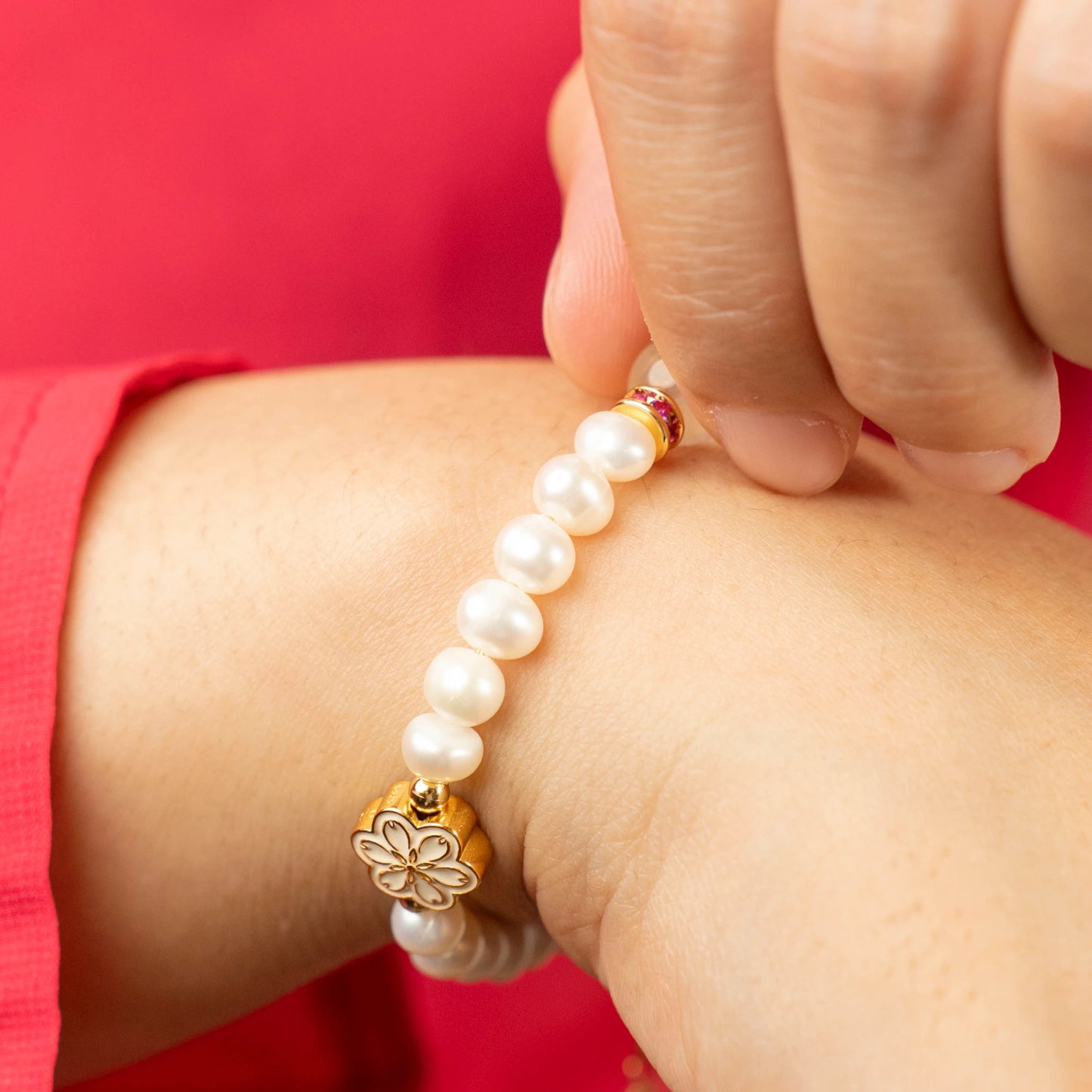 A meaningful April birthday gift. This Mulstio bracelet features the timeless wisdom of Pearl alongside the vibrant vitality of Blue Topaz, the modern April birthstone.