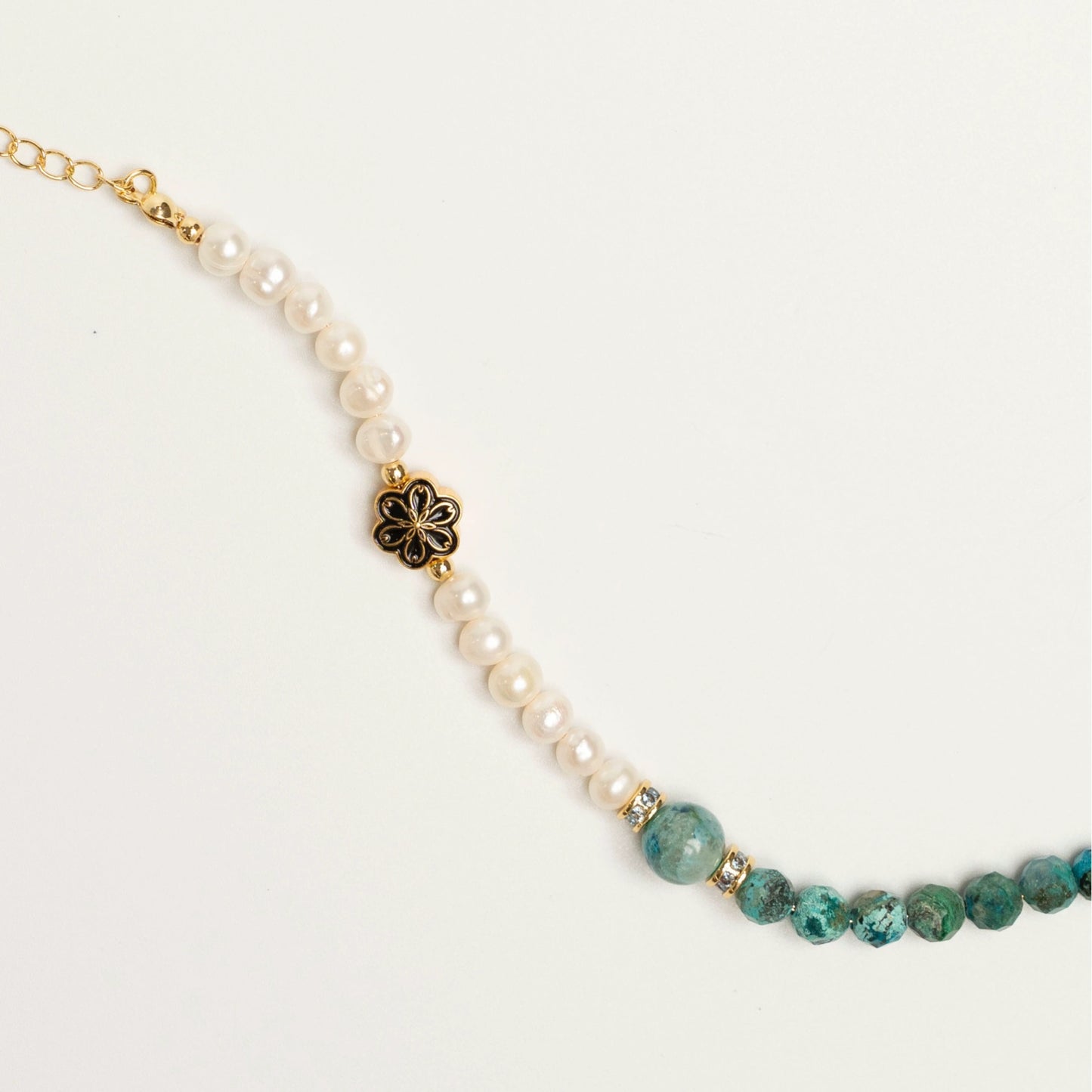The healing energy of Turquoise combined with the calming wisdom of Pearl in one bracelet.
