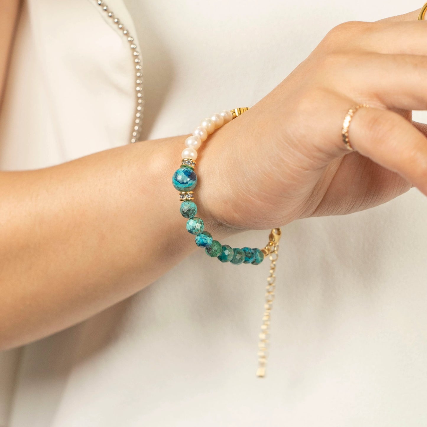 A gift-ready Mulstio box containing the December Birthstone Turquoise Pearl bracelet.