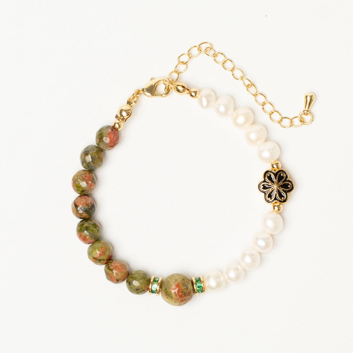 A talisman for caregivers and empaths. This Mulstio bracelet uses Unakite to balance the heart and Pearl to nurture the spirit, preventing emotional exhaustion.
