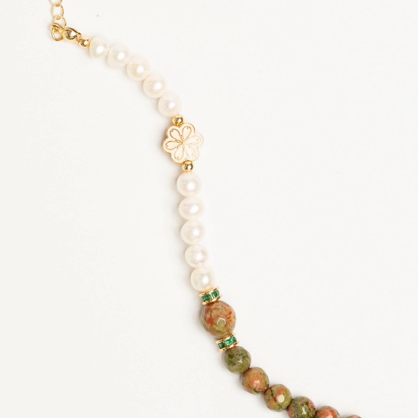 Embody the Mulstio ethos of holistic well-being. This May bracelet uses Unakite and Pearl to support your journey toward emotional balance and self-nurturing.