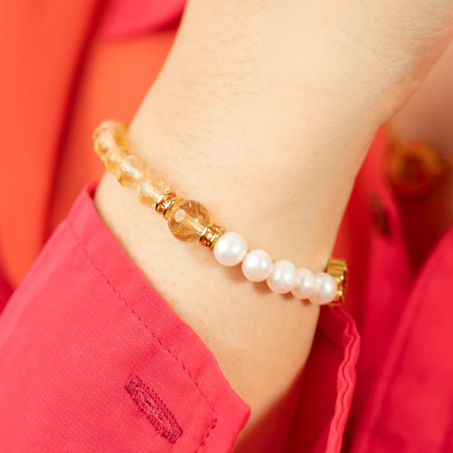A powerful gift for November birthdays. This Mulstio bracelet combines the prosperity energy of Citrine with the sincere blessings embodied by Pearl.