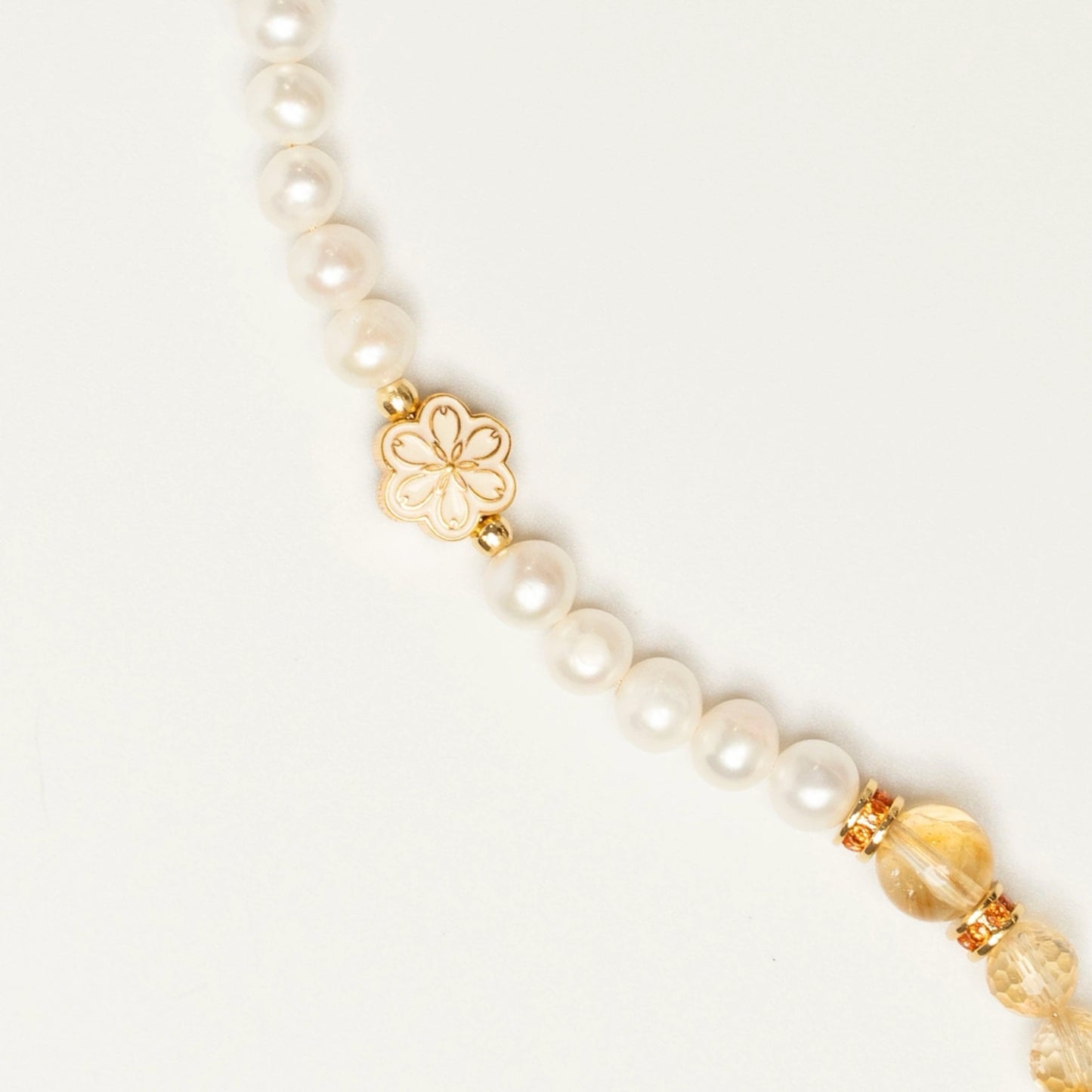 Mulstio's vision: Abundance is your birthright. This November bracelet channels the unstoppable energy of Citrine to help you claim it with the grace of Pearl.