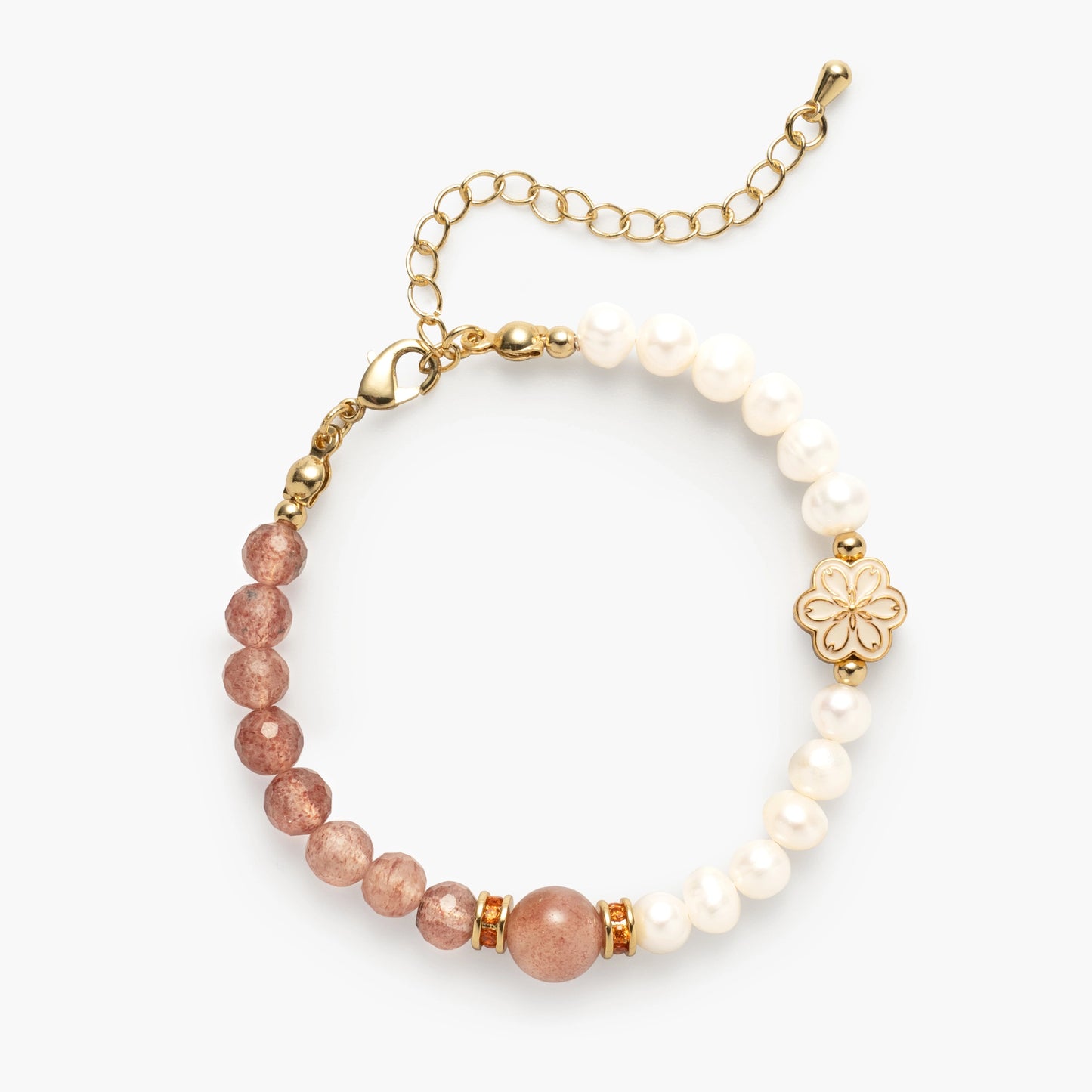 The October Birthstone Bracelet by Mulstio, a delightful blend of Pink Strawberry Quartz for a vibrant, joyful heart and Pearl for a calm, serene mind, creating a balanced upliftment.