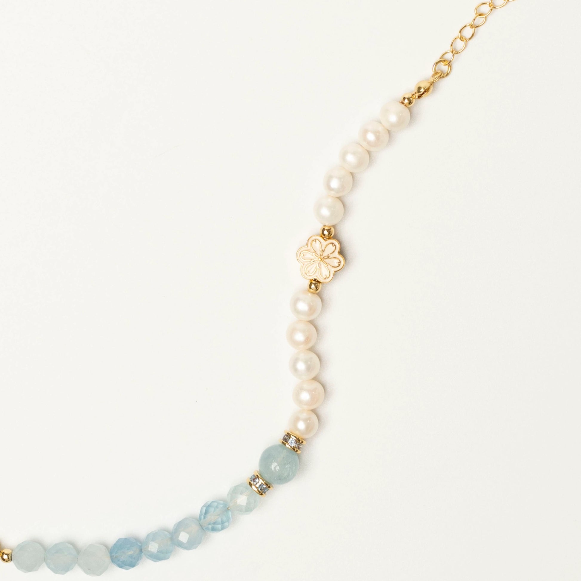 A signature spliced-design birthstone bracelet by Mulstio, showcasing innovative craftsmanship in modern energy jewelry for March.