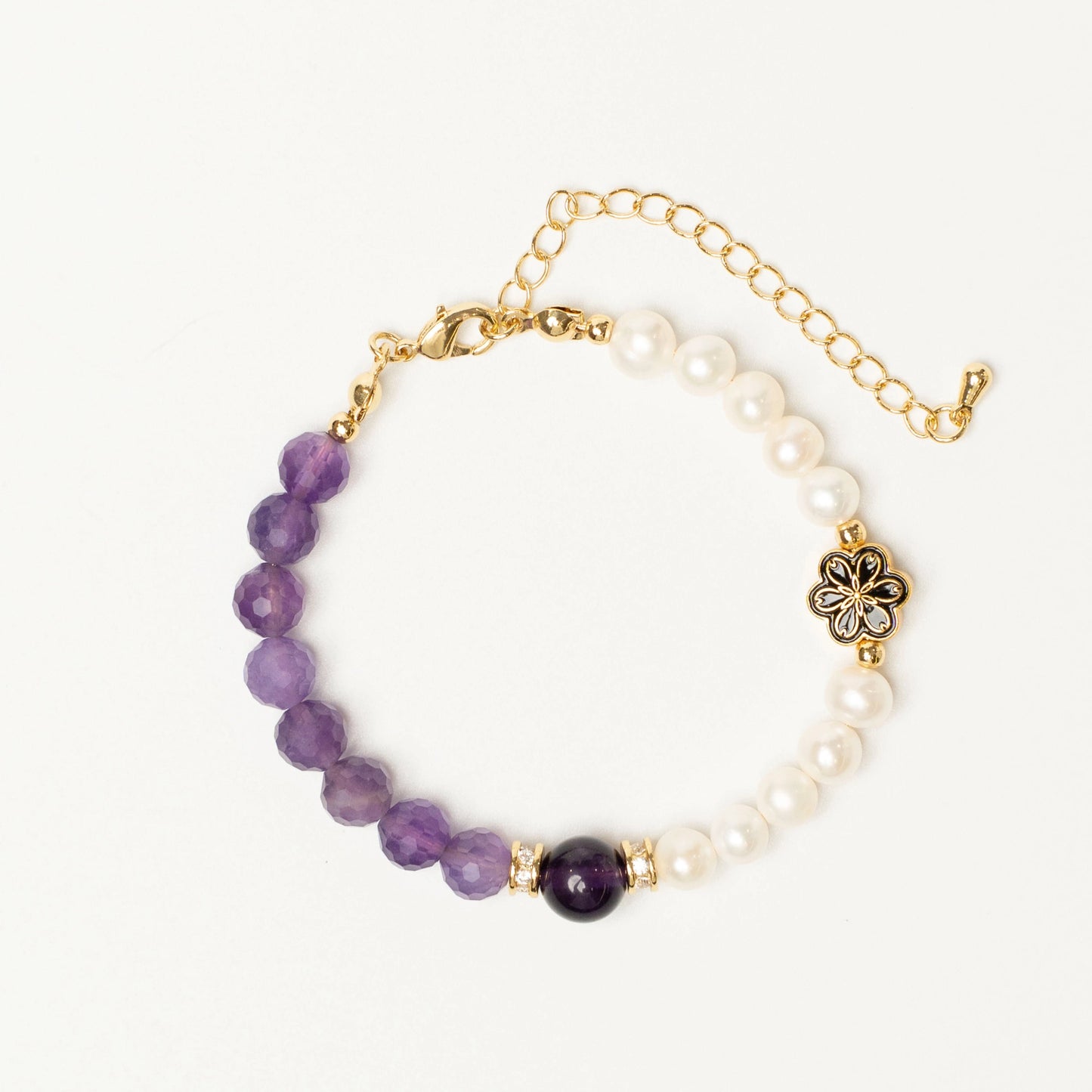 Celebrate February birthdays with both modern (Amethyst) and traditional (Pearl) birthstones in one meaningful bracelet from Mulstio.