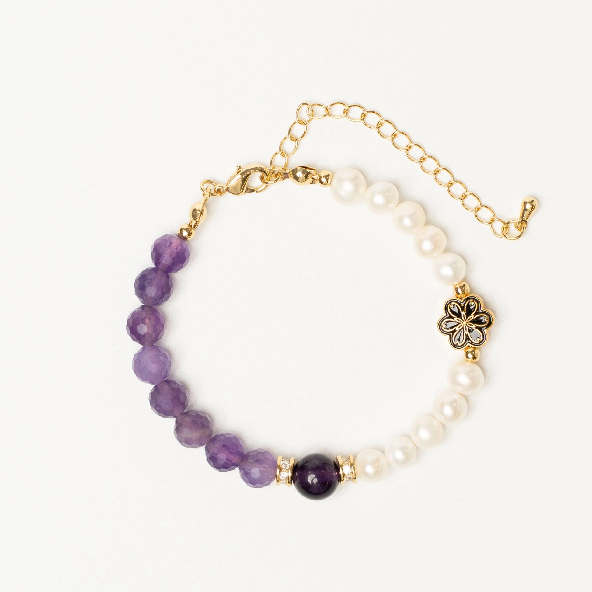 Celebrate February birthdays with both modern (Amethyst) and traditional (Pearl) birthstones in one meaningful bracelet from Mulstio.