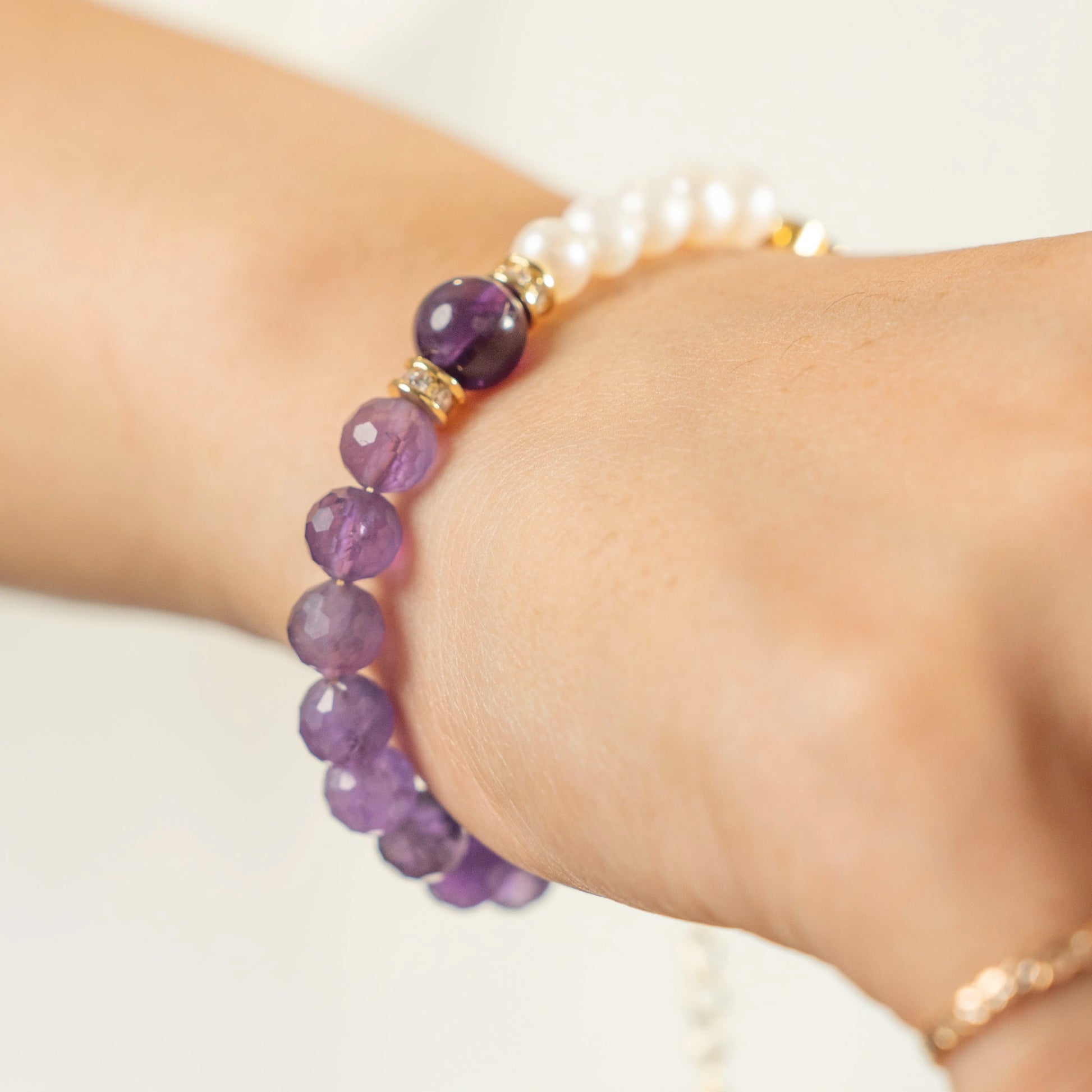 Discover the ultimate February birthday present: The Mulstio Amethyst and Pearl Bracelet, a thoughtful and energetically-charged gift for her or him.