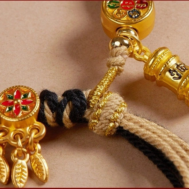 Cotton Handwoven Two-Tone Adjustable Bracelet with Six-Syllable Mantra, Dreamcatcher & Prayer Wheel – WoodMetal Element for Calm, Protection & Purification