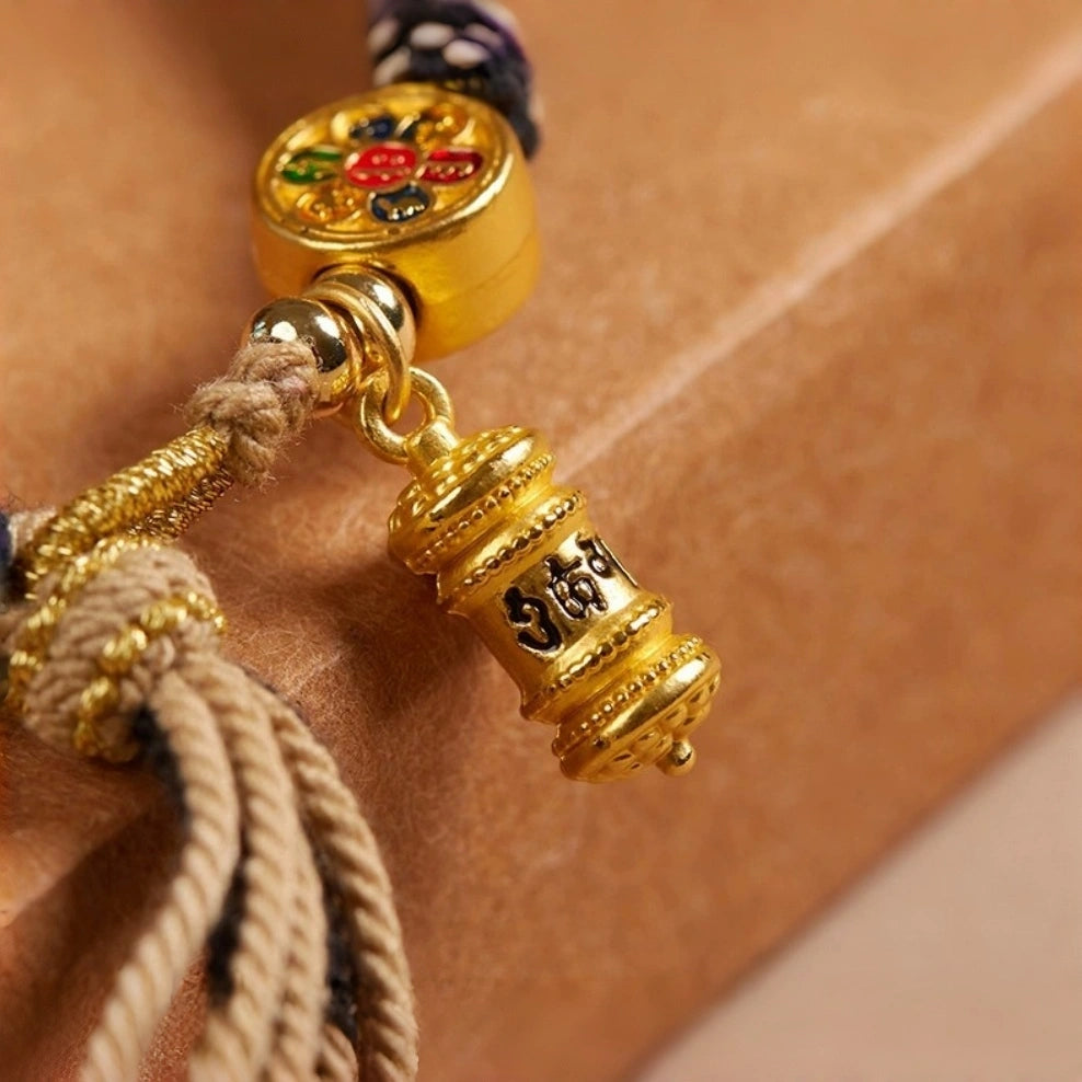 Cotton Handwoven Two-Tone Adjustable Bracelet with Six-Syllable Mantra, Dreamcatcher & Prayer Wheel – WoodMetal Element for Calm, Protection & Purification