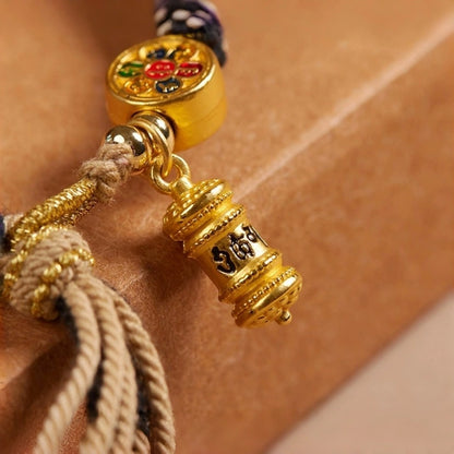 Cotton Handwoven Two-Tone Adjustable Bracelet with Six-Syllable Mantra, Dreamcatcher & Prayer Wheel – WoodMetal Element for Calm, Protection & Purification