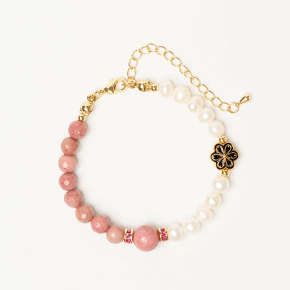 A talisman for the healing heart. This Mulstio bracelet uses Inca Rose to release old emotional wounds and Pearl to instill a sense of peace and self-worth.