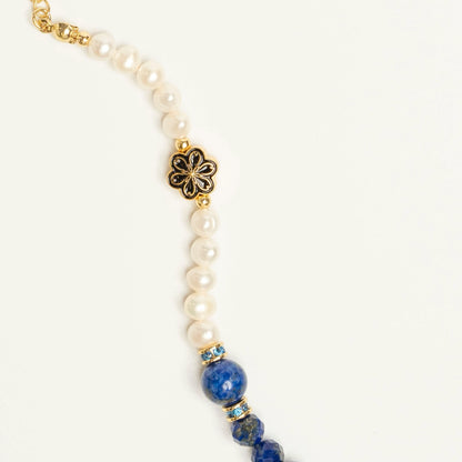 For the philosopher and truth-teller. Wear this Mulstio design with Lapis Lazuli to seek objective truth and Pearl to understand it with subjective compassion and wisdom.
