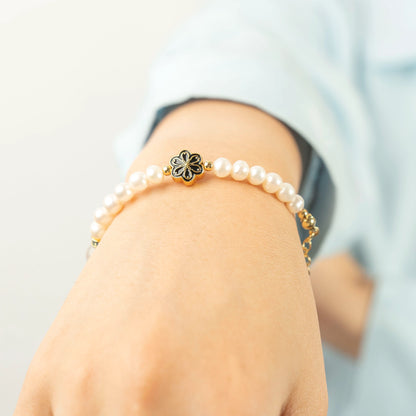 The quintessential June birthday gift for her. This Mulstio bracelet beautifully combines the classic Pearl with the mystical Moonstone, the modern June birthstone.