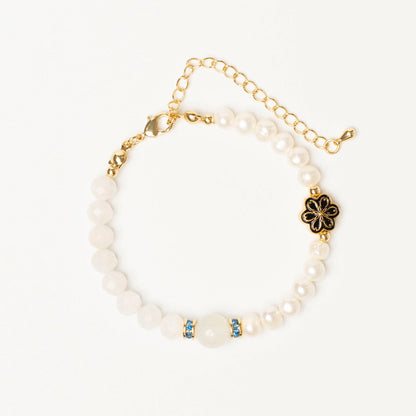 A talisman for the intuitive soul. This Mulstio bracelet blends Moonstone's connection to inner knowing with Pearl's energy of serene grace, empowering your feminine energy.