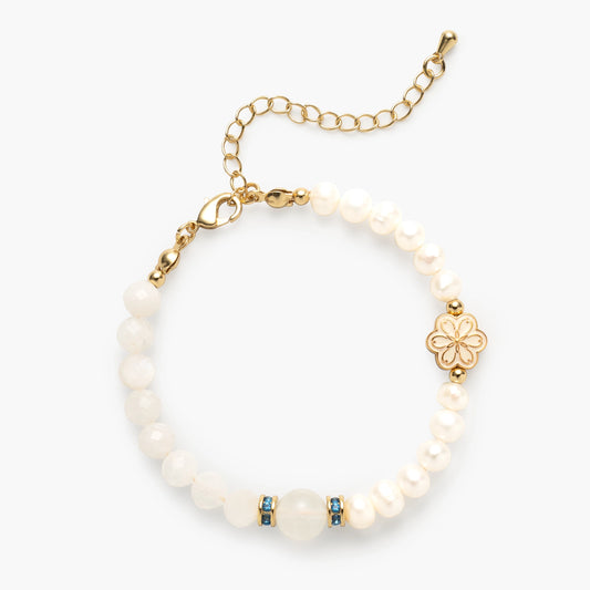 The June Birthstone Bracelet by Mulstio, a divine union of Moonstone for enhanced intuition and Pearl for graceful wisdom, connecting you to the moon's mystical energy.
