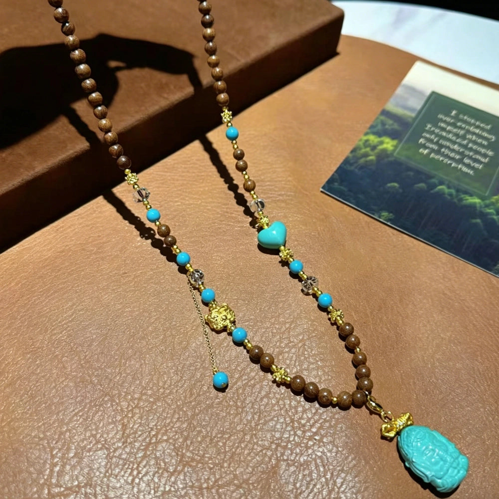 Mulstio Lord Ganesha Magnesite Turquoise and Sandalwood Empowerment Necklace for Inner Peace
