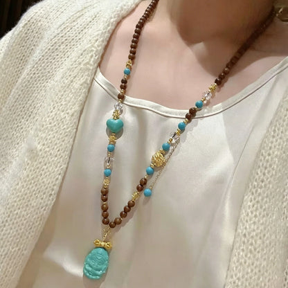 Mulstio Lord Ganesha Magnesite Turquoise and Sandalwood Empowerment Necklace for Inner Peace