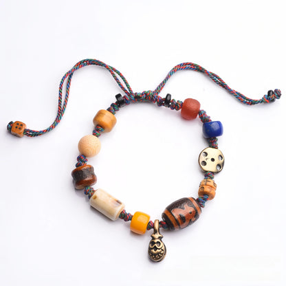 Tibetan Buddhist Ox Bone Carved Handwoven Bracelet - Cotton, Ox Bone, Brass, Sandalwood, Lapis Lazuli, Glass, Agate - Earth+Metal Element, Protection & Grounding