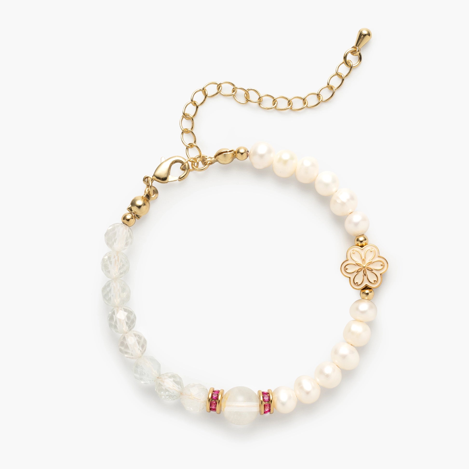 The April Birthstone Bracelet by Mulstio, a harmonious blend of vibrant Blue Topaz for vitality and luminous Pearl for wisdom, creating a balanced energy flow.