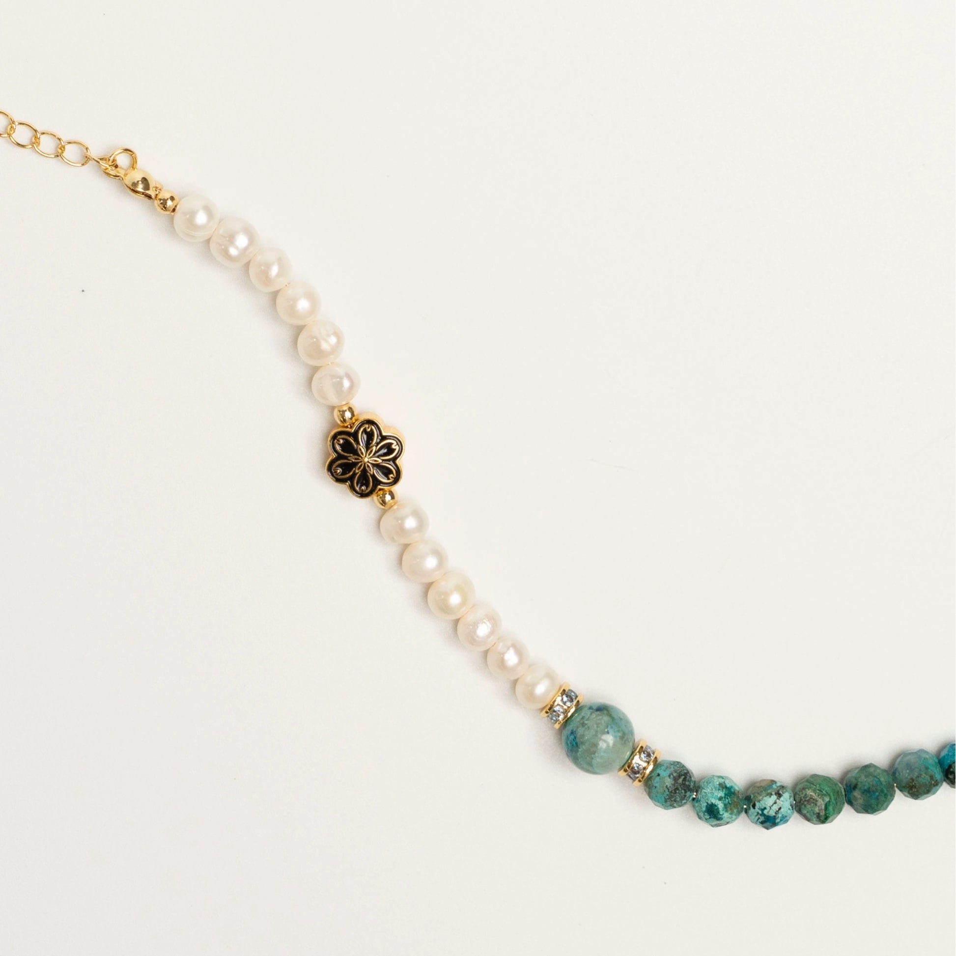 The healing energy of Turquoise combined with the calming wisdom of Pearl in one bracelet.