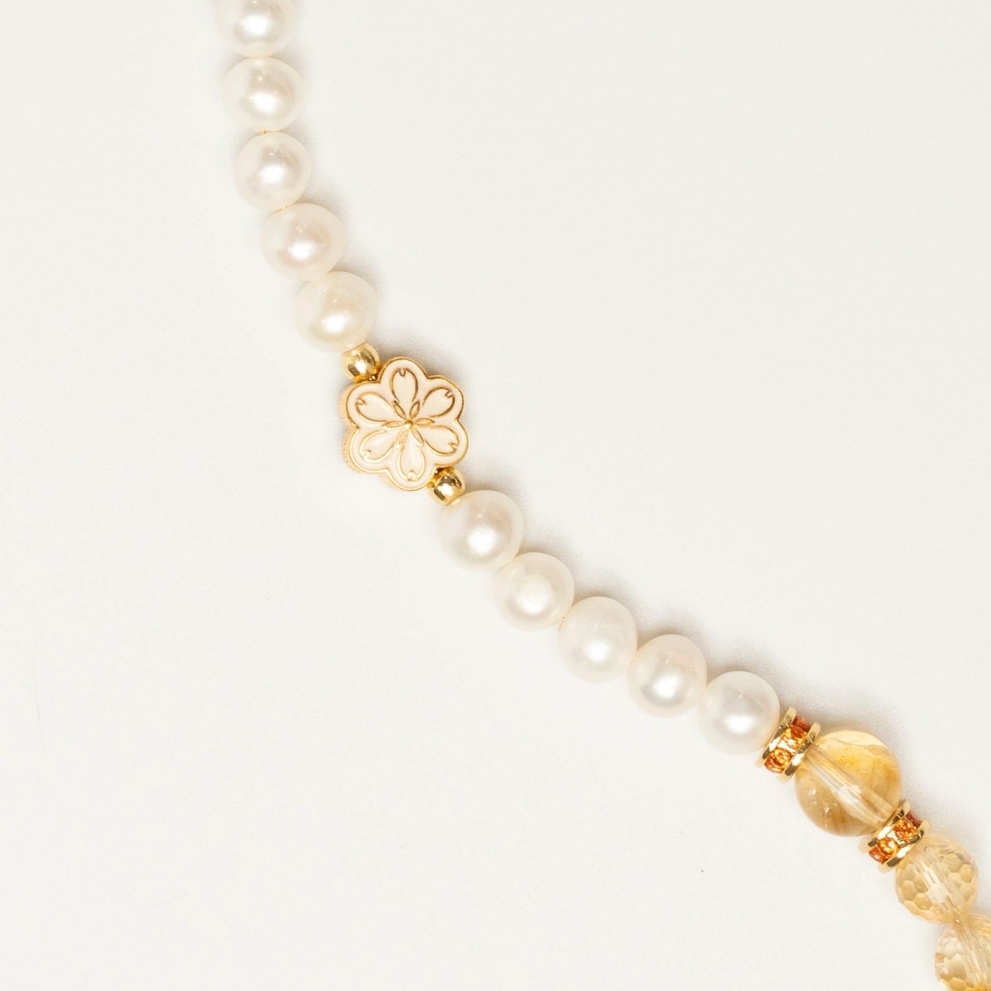 Mulstio's vision: Abundance is your birthright. This November bracelet channels the unstoppable energy of Citrine to help you claim it with the grace of Pearl.